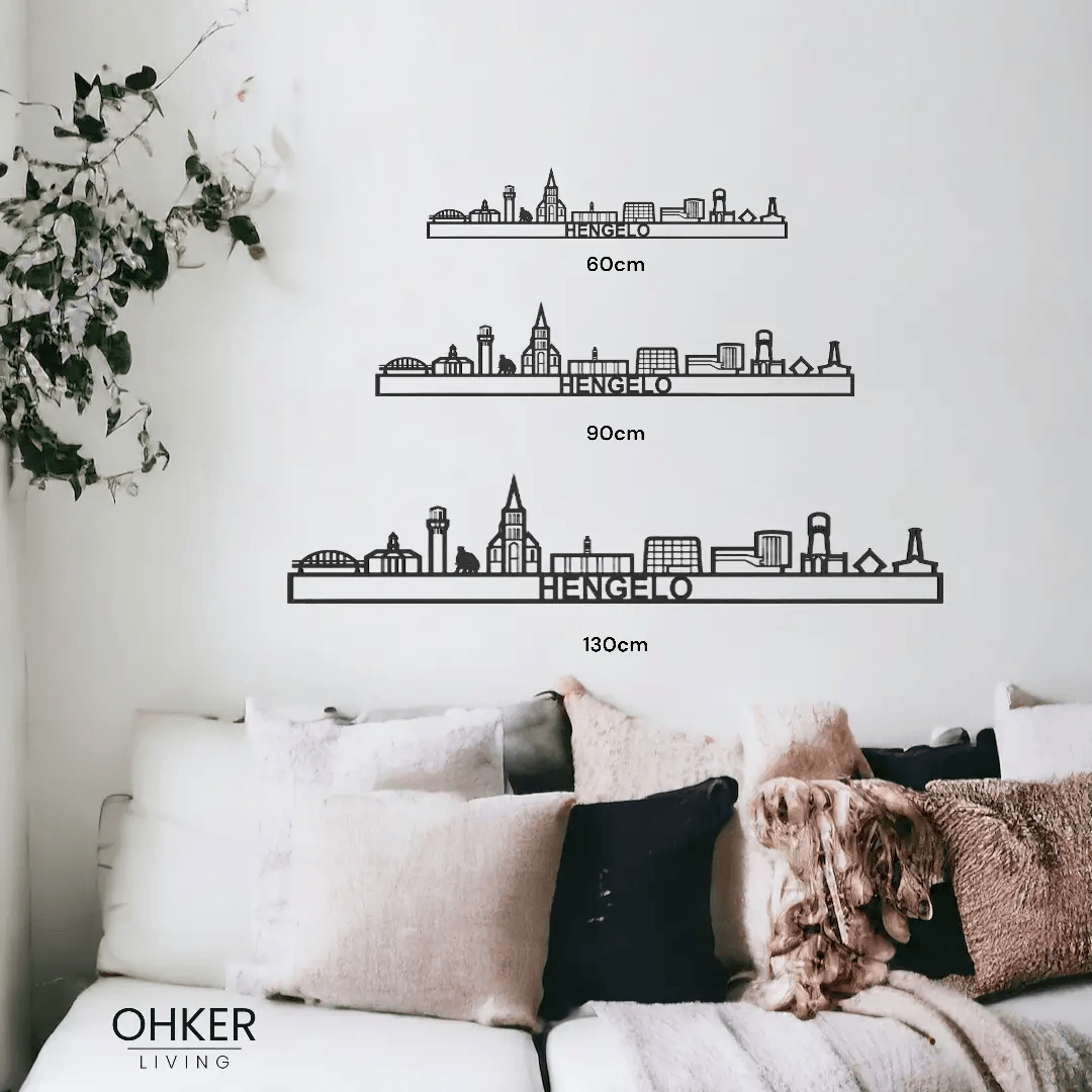 Hengelo skyline wall art collection showcasing different sizes in a cozy living room setting.